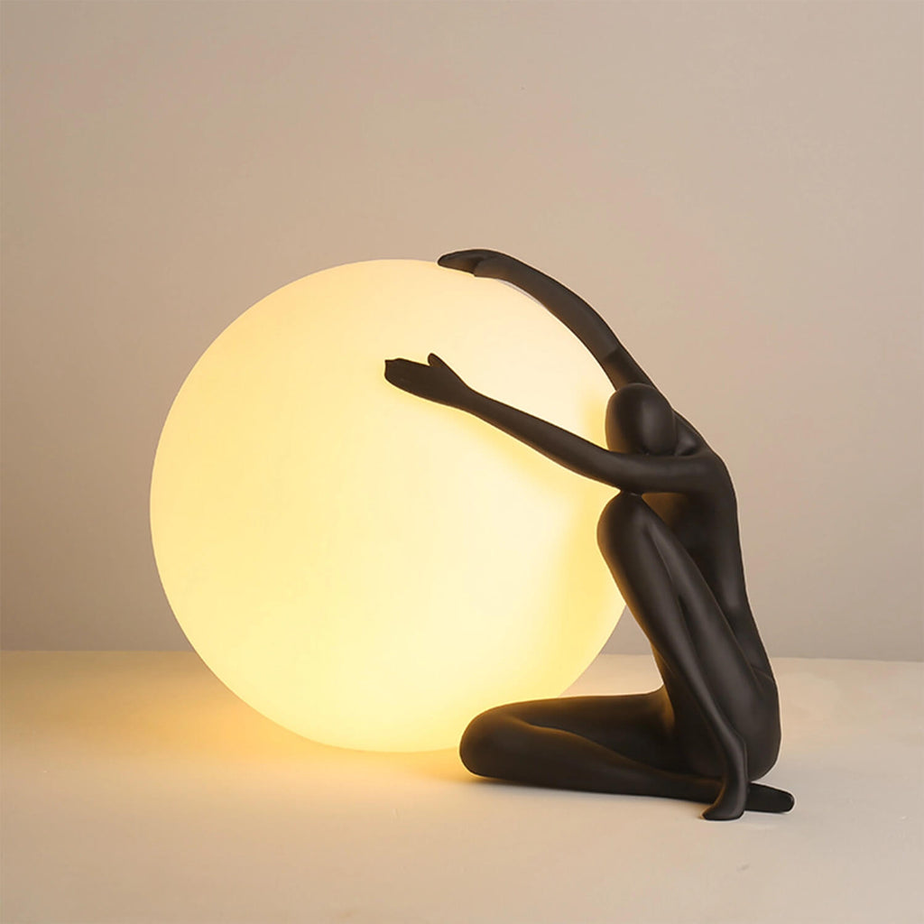 Black Figurine Holding Sphere LED Table Lamp: Minimalist Dynamic Sculpture, Warm Ambient Glow – Living Room Accent/Modern Office Decor Lighting
