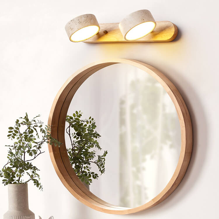 Coolilumi Travertine Wall Light – Adjustable solid wood wall lamp installed above a bathroom mirror, combining style with functional mirror lighting.