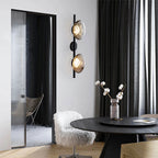 Contemporary Double Head Wall Sconce for Living-Dining Room: Amber Glass Shades, Black Metal Frame – Soft Ambient Glow | Modern Luxury Decor