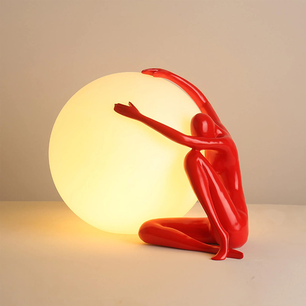 Red Figurine Holding Sphere LED Table Lamp: Artistic Dynamic Sculpture, Warm Ambient Glow – Living Room Accent/Modern Office Decor Lighting