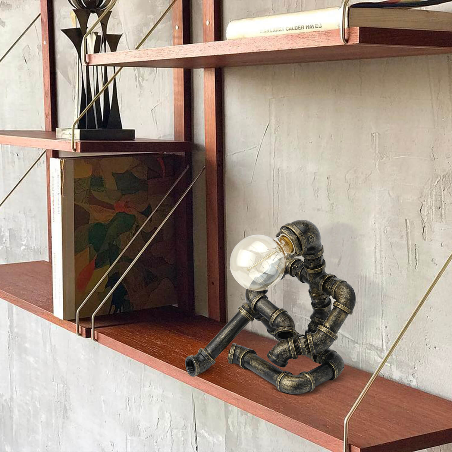Bronze Pipe Robot Table Lamp on Wooden Bookshelf - Globe Bulb | Industrial Steampunk Decor for Home Library, Office Shelf or Modern Living Room